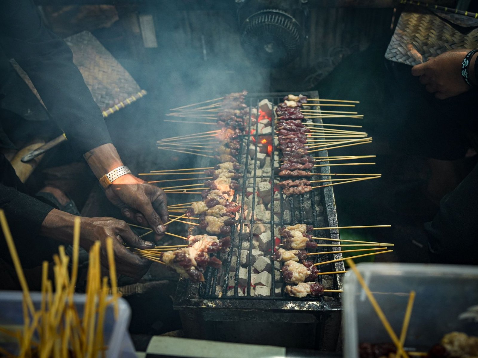 Authentic street food experience in Purwakarta with satay grilling over coals. Captures cultural essence.