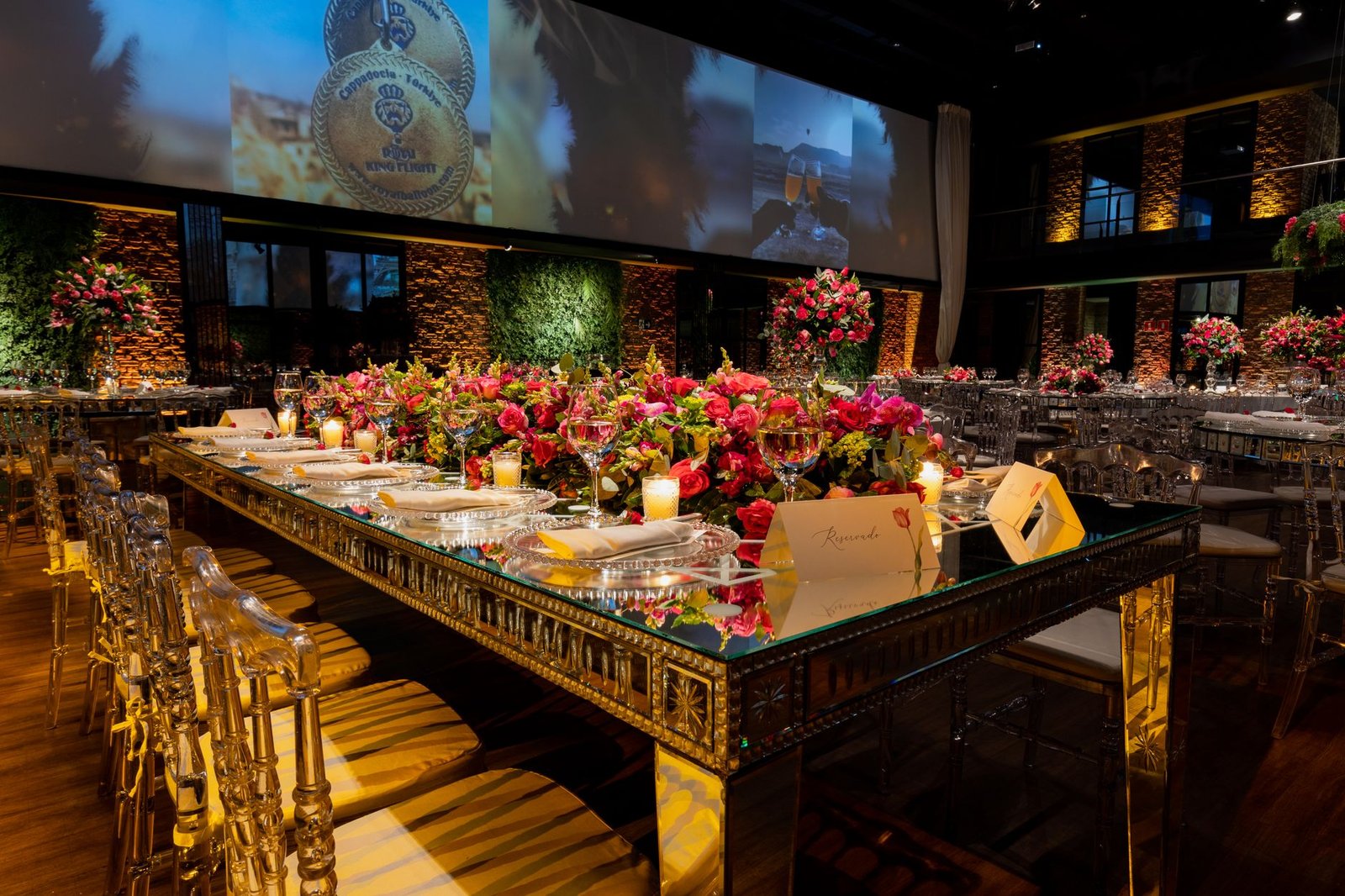 Elegant wedding reception setup with lavish floral centerpieces and chic table arrangements.