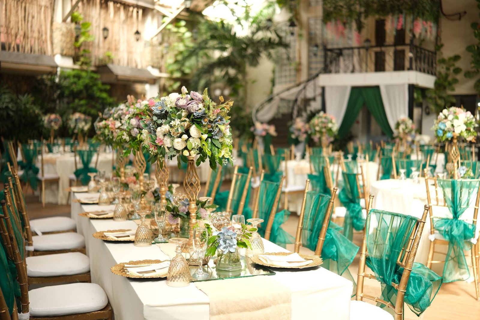 Beautifully decorated wedding reception venue in Las Piñas, Philippines featuring lavish floral arrangements and elegant table settings.